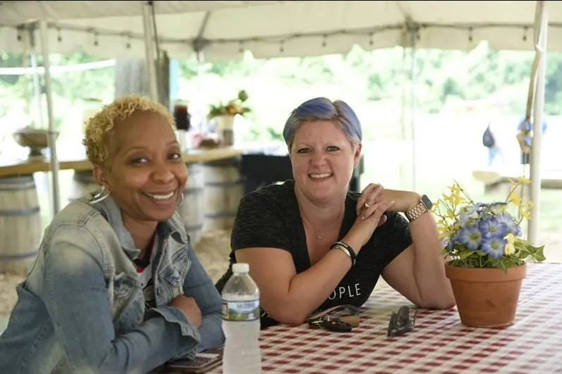 Pam & Trina enjoying a chat at the Summer Picnic.