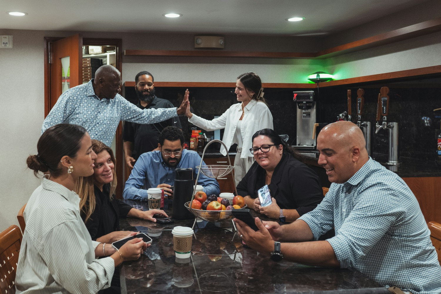 Shared moments outside of meetings, connecting over snacks & conversation, strengthen relationships and build community.