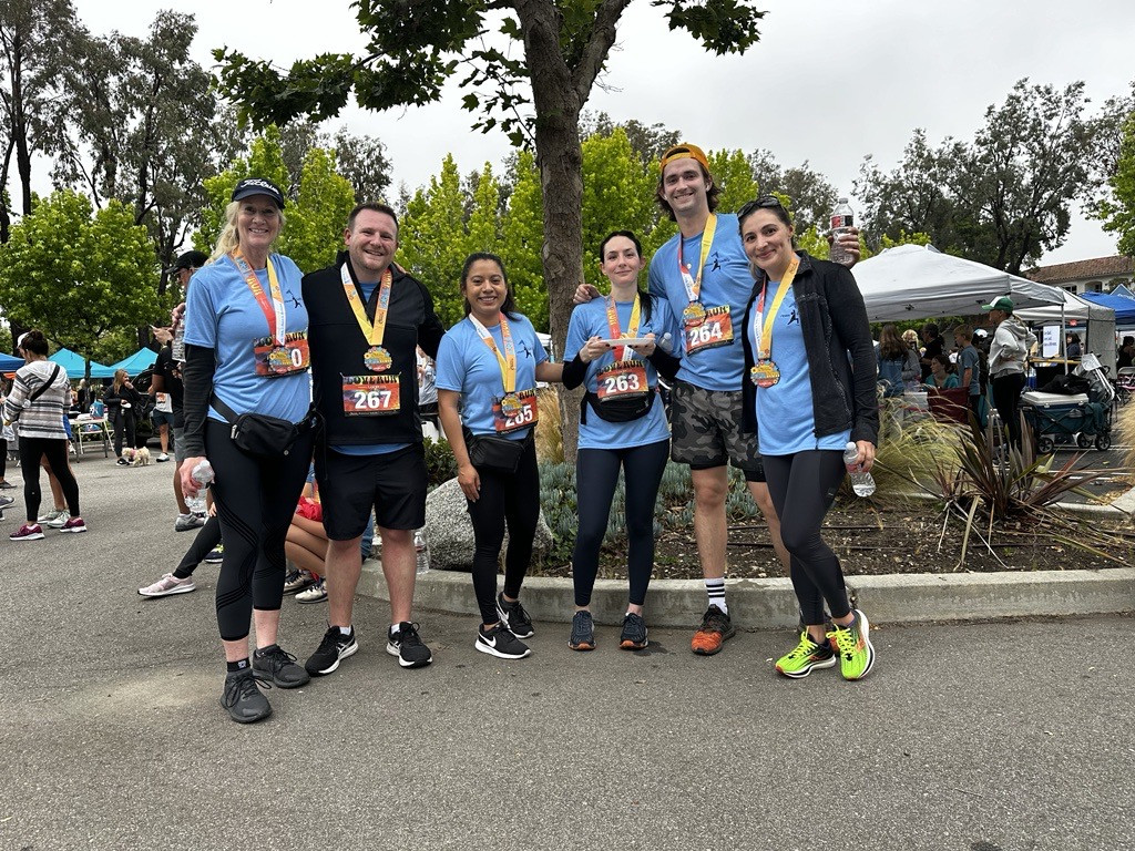 CNM's Fitness ERG warming up for the 2024 Love Run 5k supporting #MealsOnWheels 