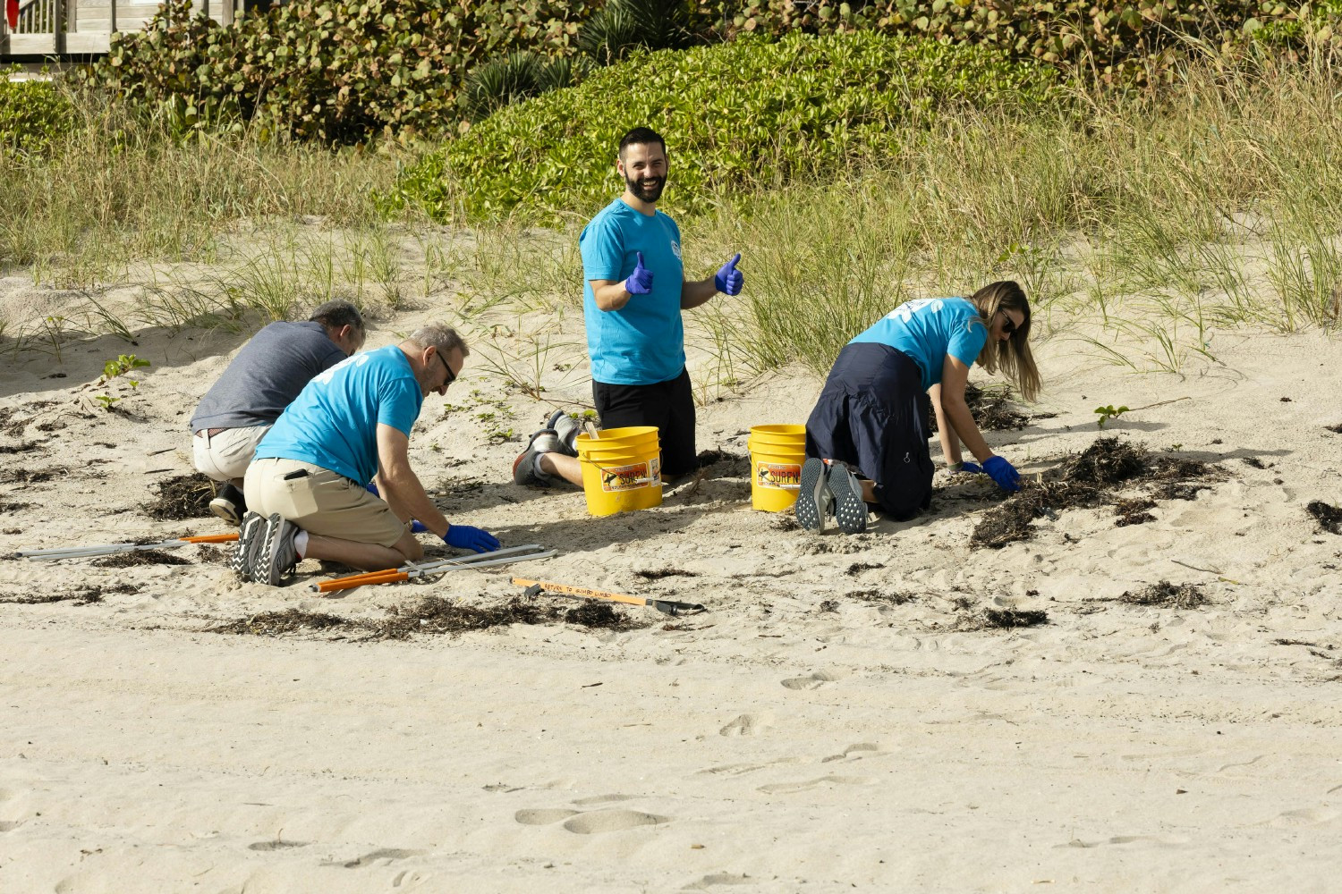 90 MDVIP employees gathered to remove trash and microplastics from our local shoreline.