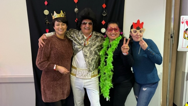 Returning to an in-person holiday party in 2023, the event was Las Vegas themed, including an appearance by Elvis.