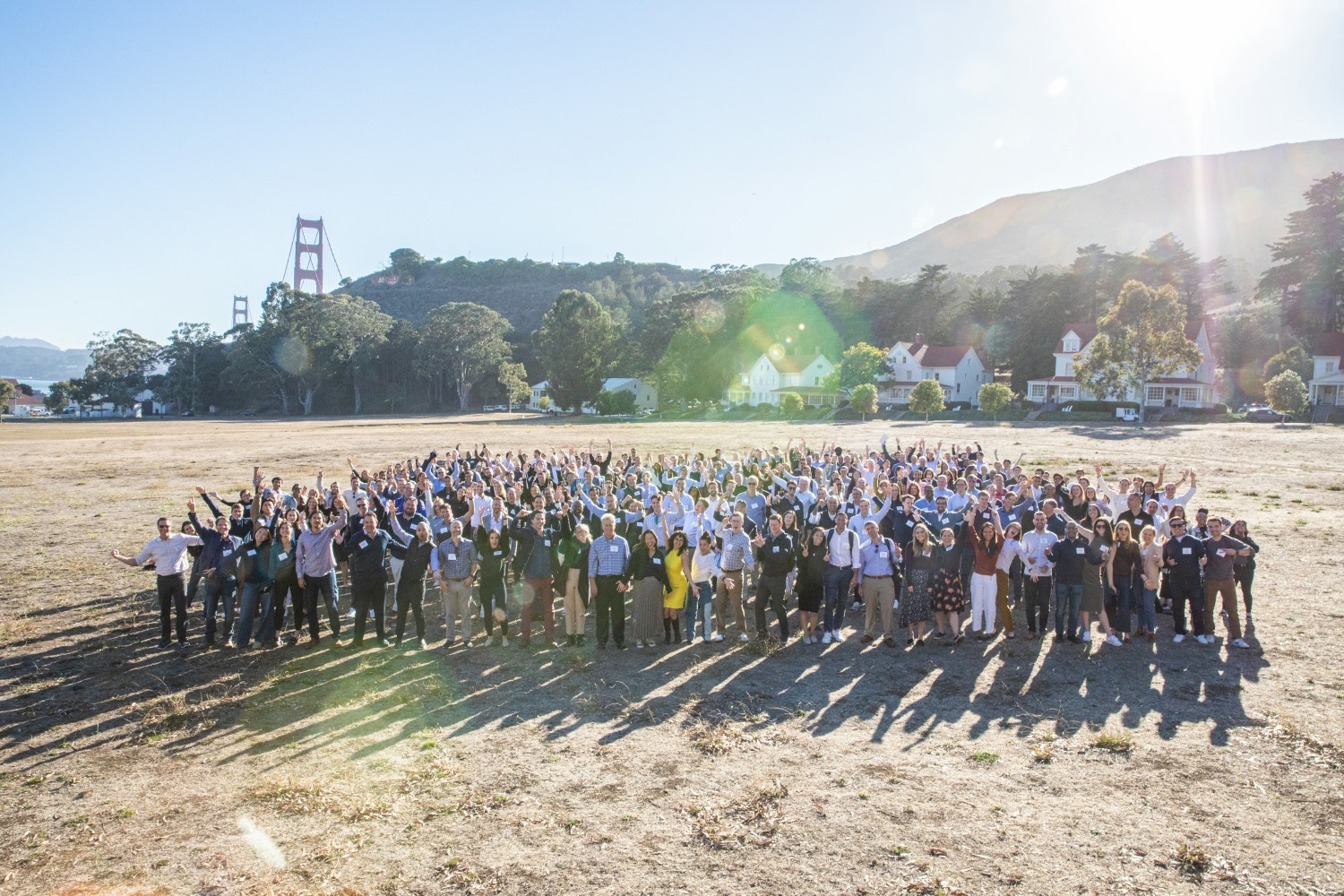 A group photo of the Alpine team and community at our annual Growth Summit event in 2022.