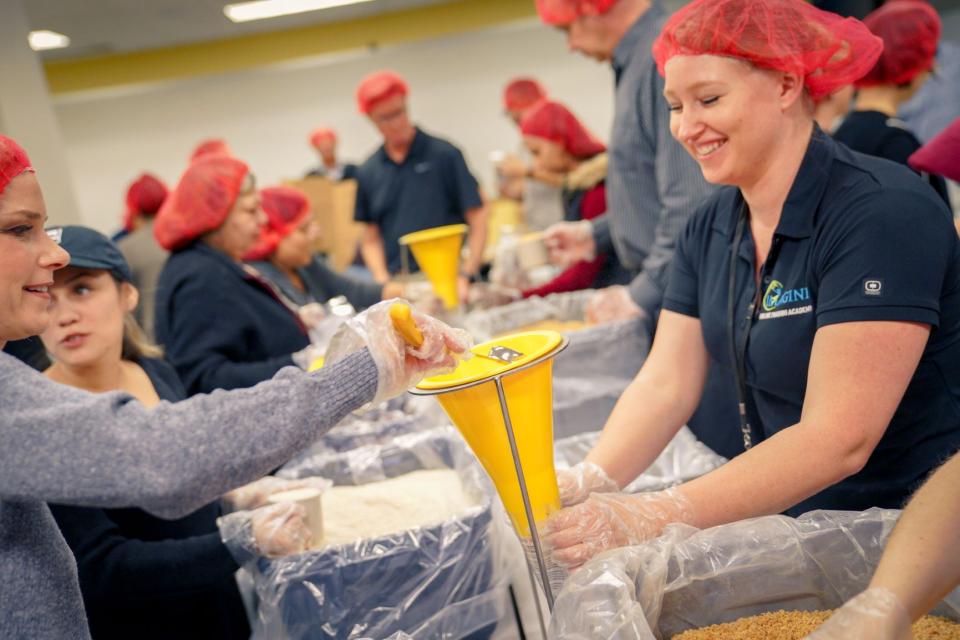 Packing food in Rise Against Hunger Campaign