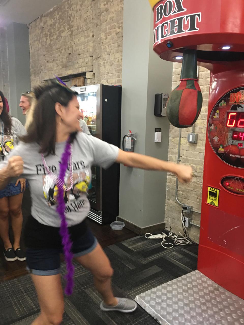 Executive hitting the punching bag