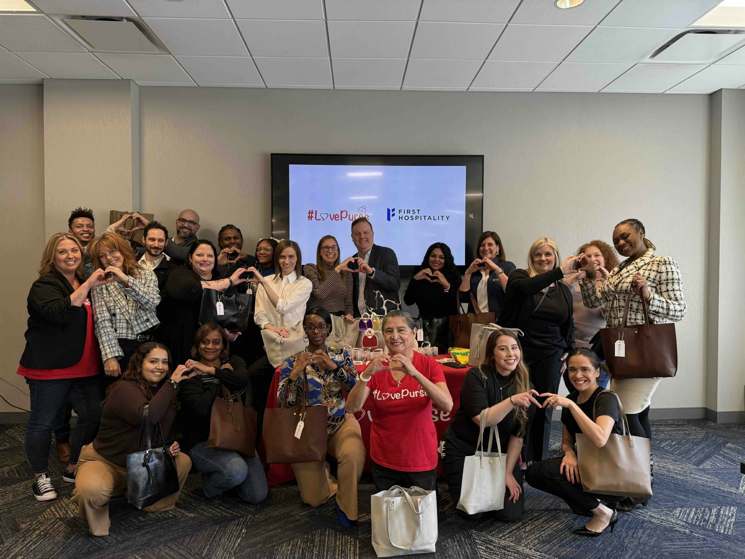 FH's D&I Council outreach - Love Purse Event - Supporting single moms and women leaving abusive relationships 