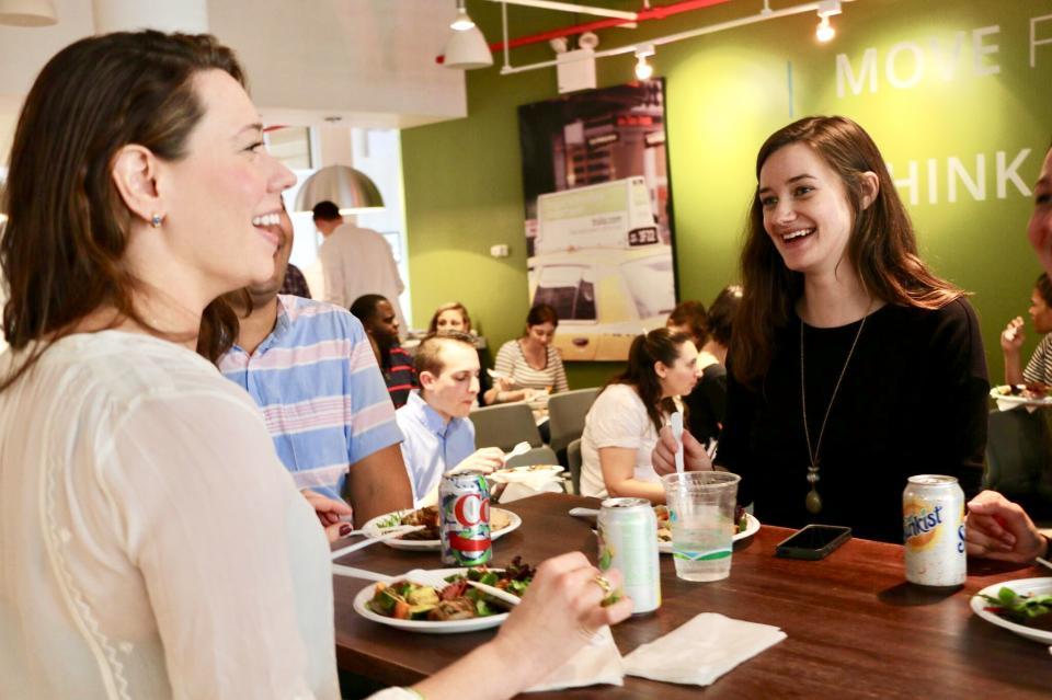 StreetEasy colleagues enjoying in-office catered lunches