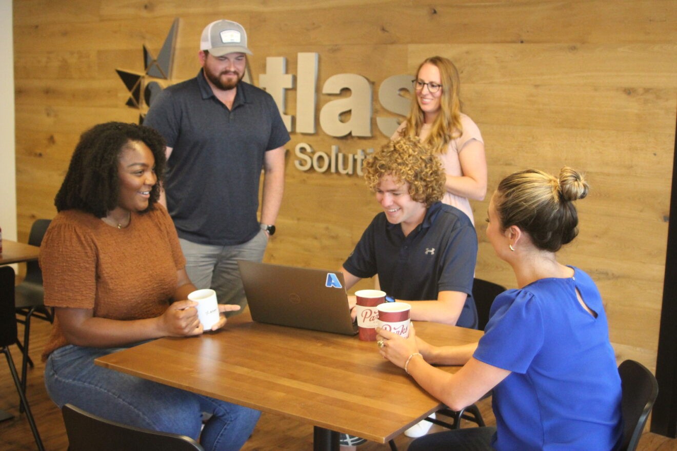 Atlas Energy Solutions employees enjoy coffee in the breakroom in Austin, TX