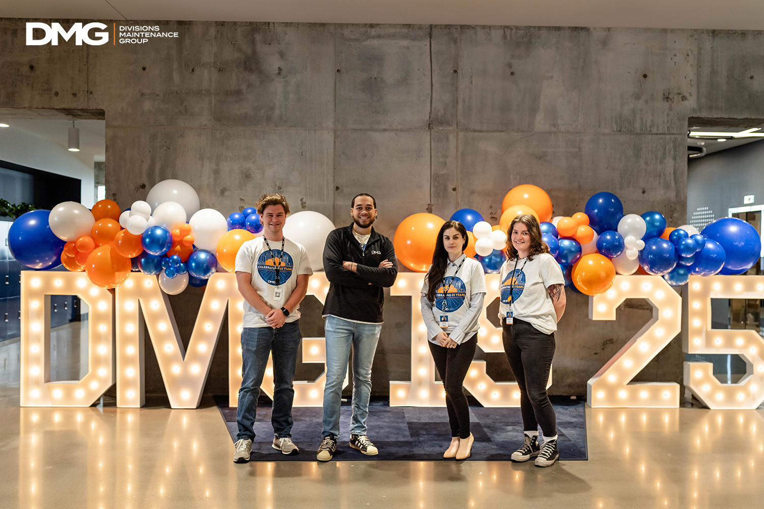 DMG team members celebrating our 25th anniversary in June of 2024!