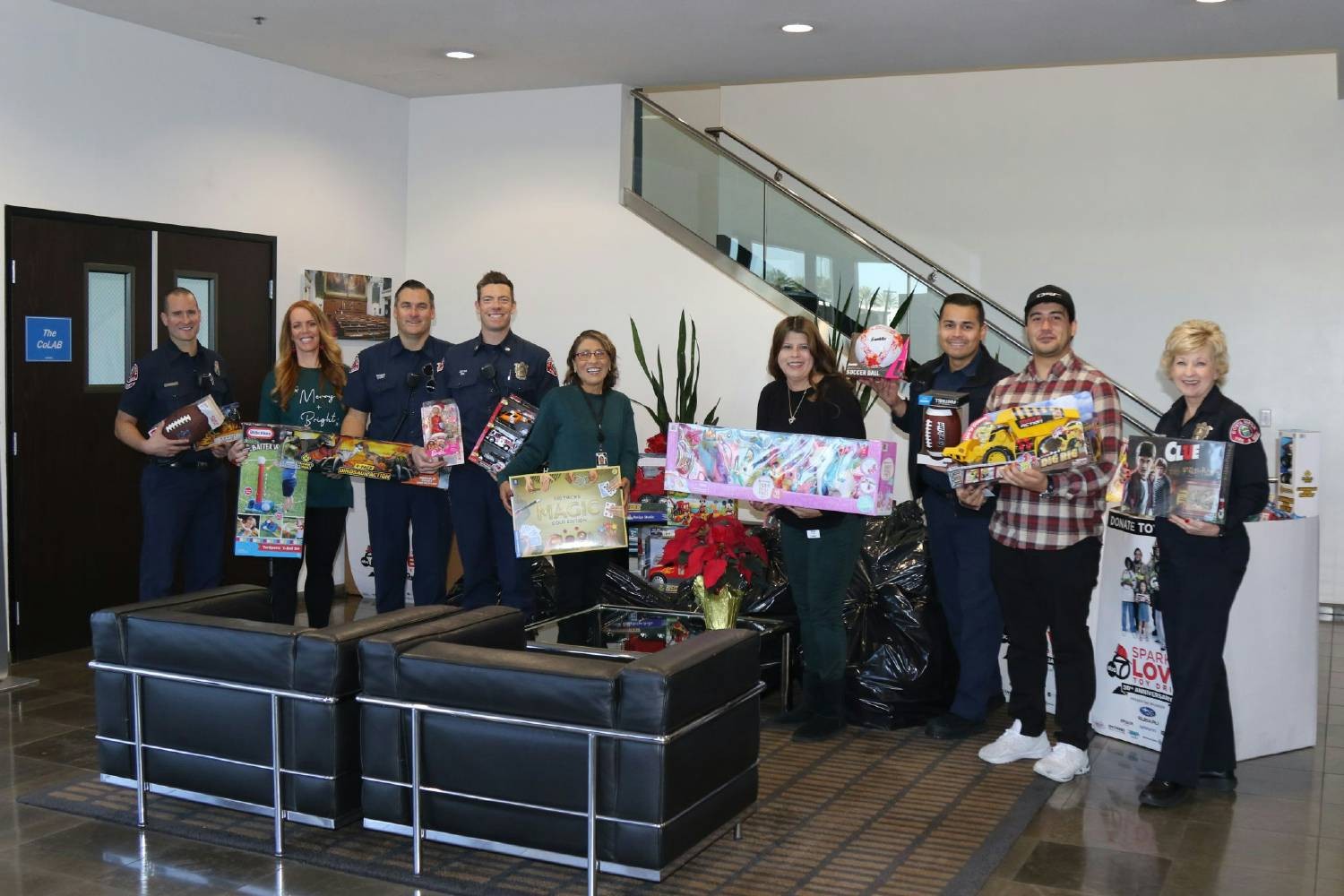 QSC Employees love giving back to the community.  This is our Spark of Love toy drive.