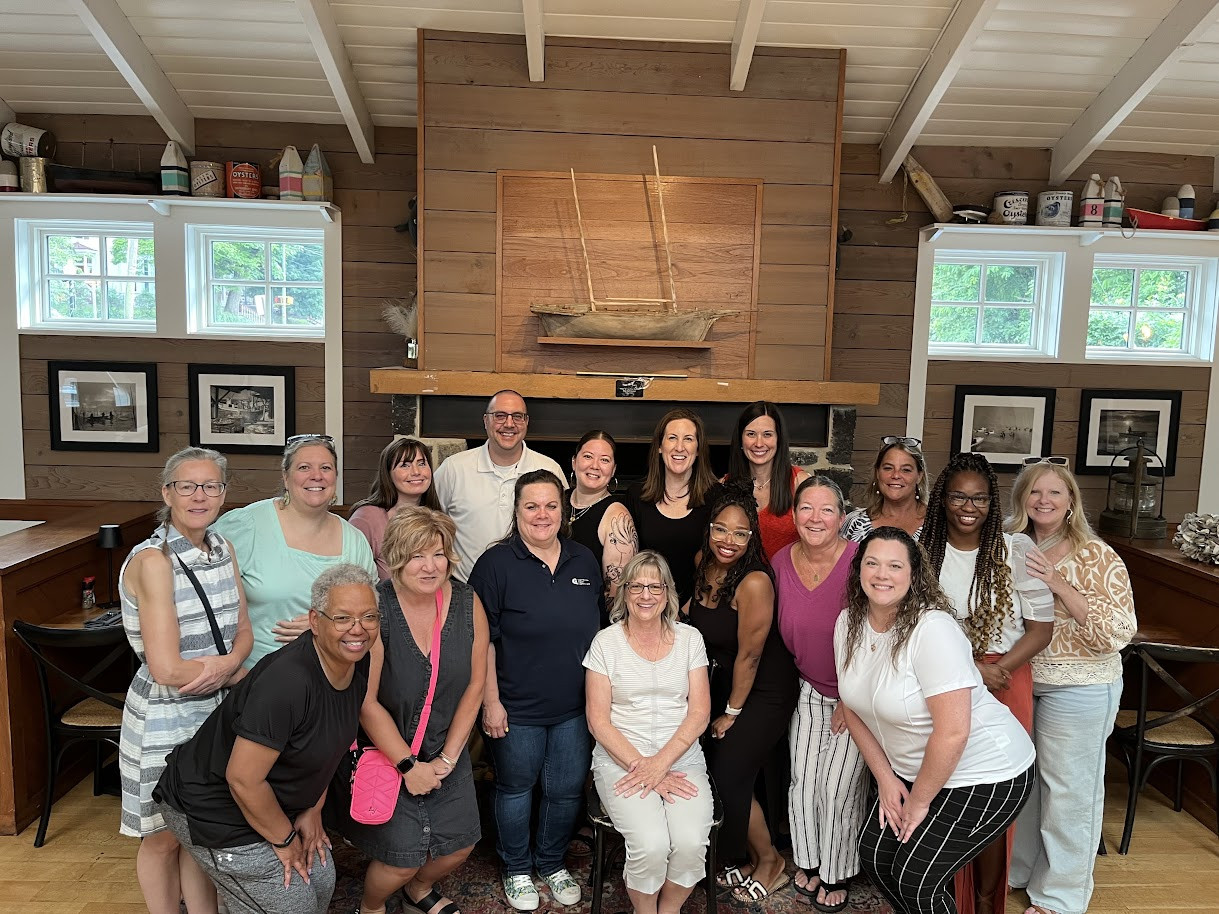 CRCers from multiple divisions gather to celebrate a fellow Team Member's decades-long service.