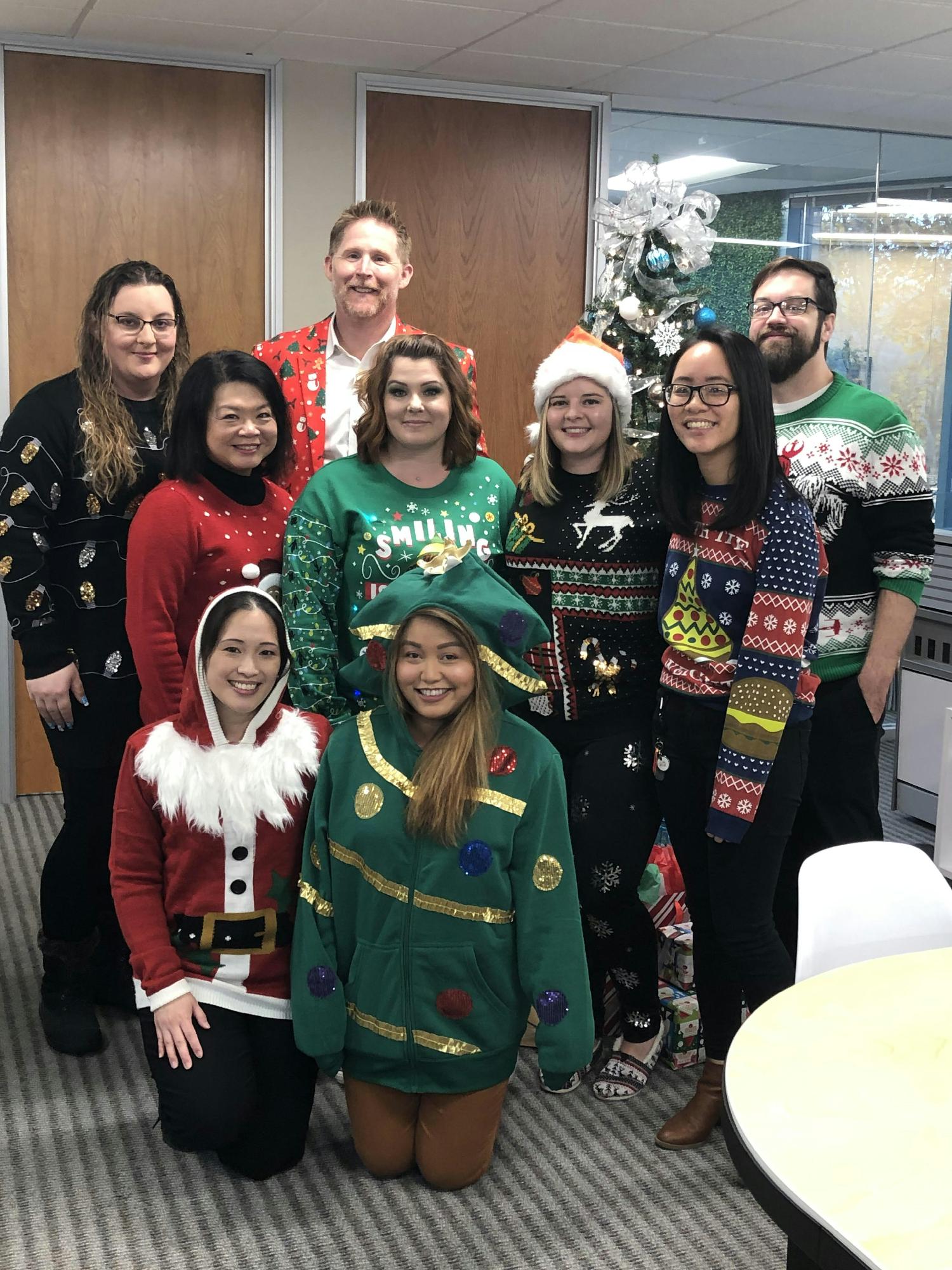 HQ's Participants for the Annual Holiday Ugly Sweater Contest