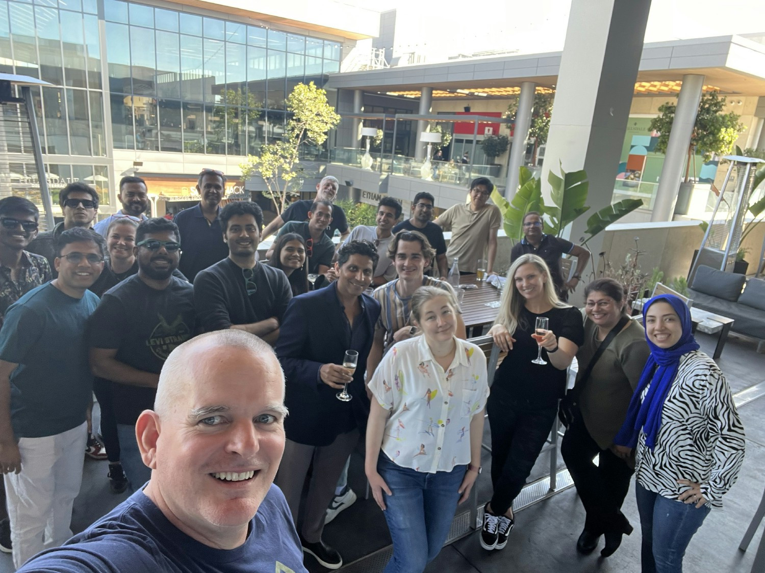 Diverse employees at the Company Happy hour