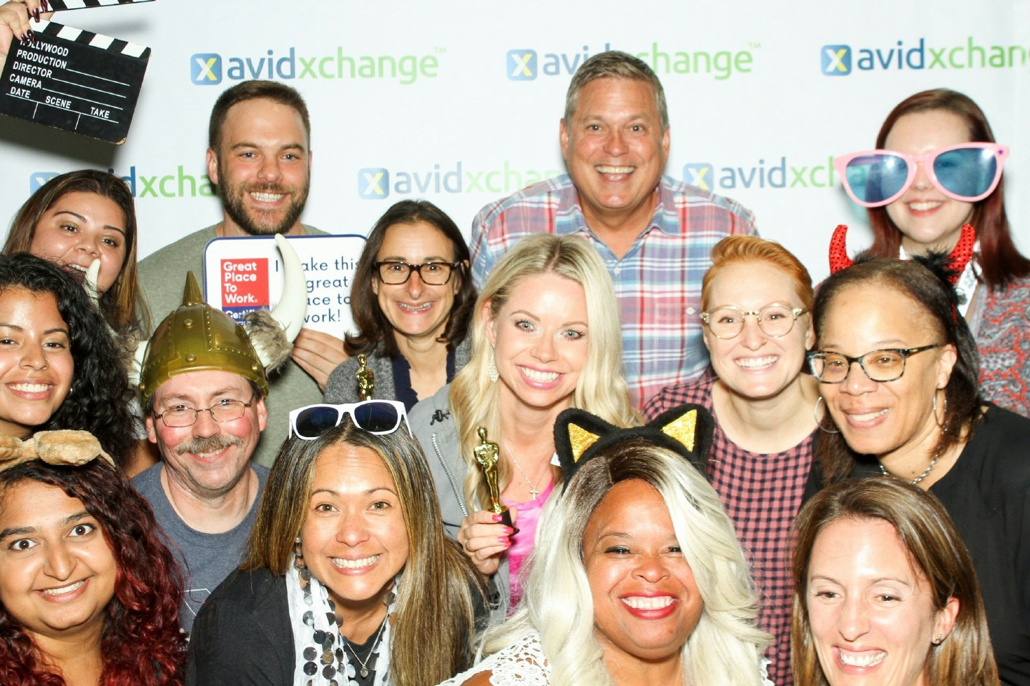 AvidXchange teammates wear big smiles as they celebrate being named a Great Place to Work in 2022. 