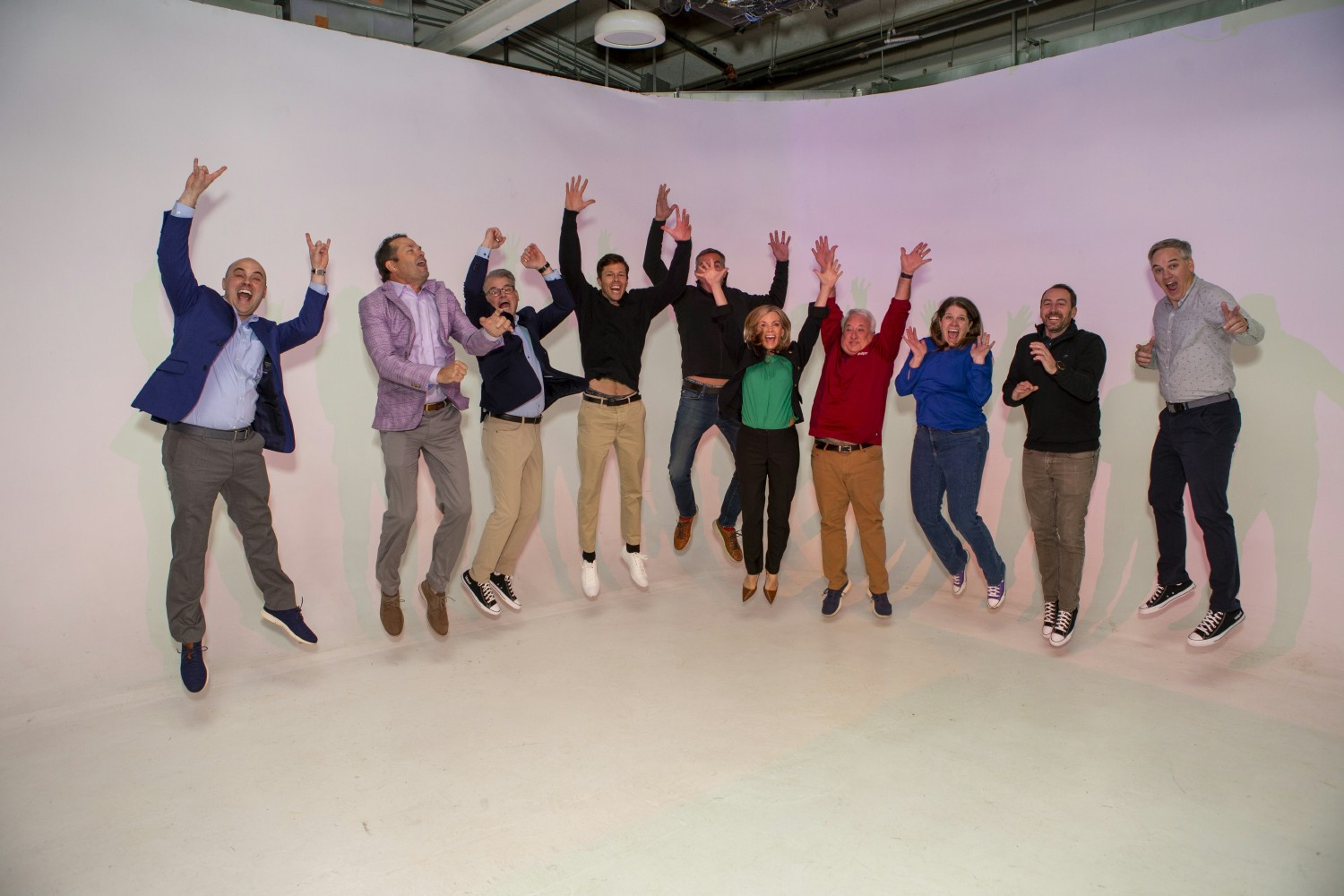 Our Executive Team jumping for joy because they just can't get over how amazing our Dialers are!
