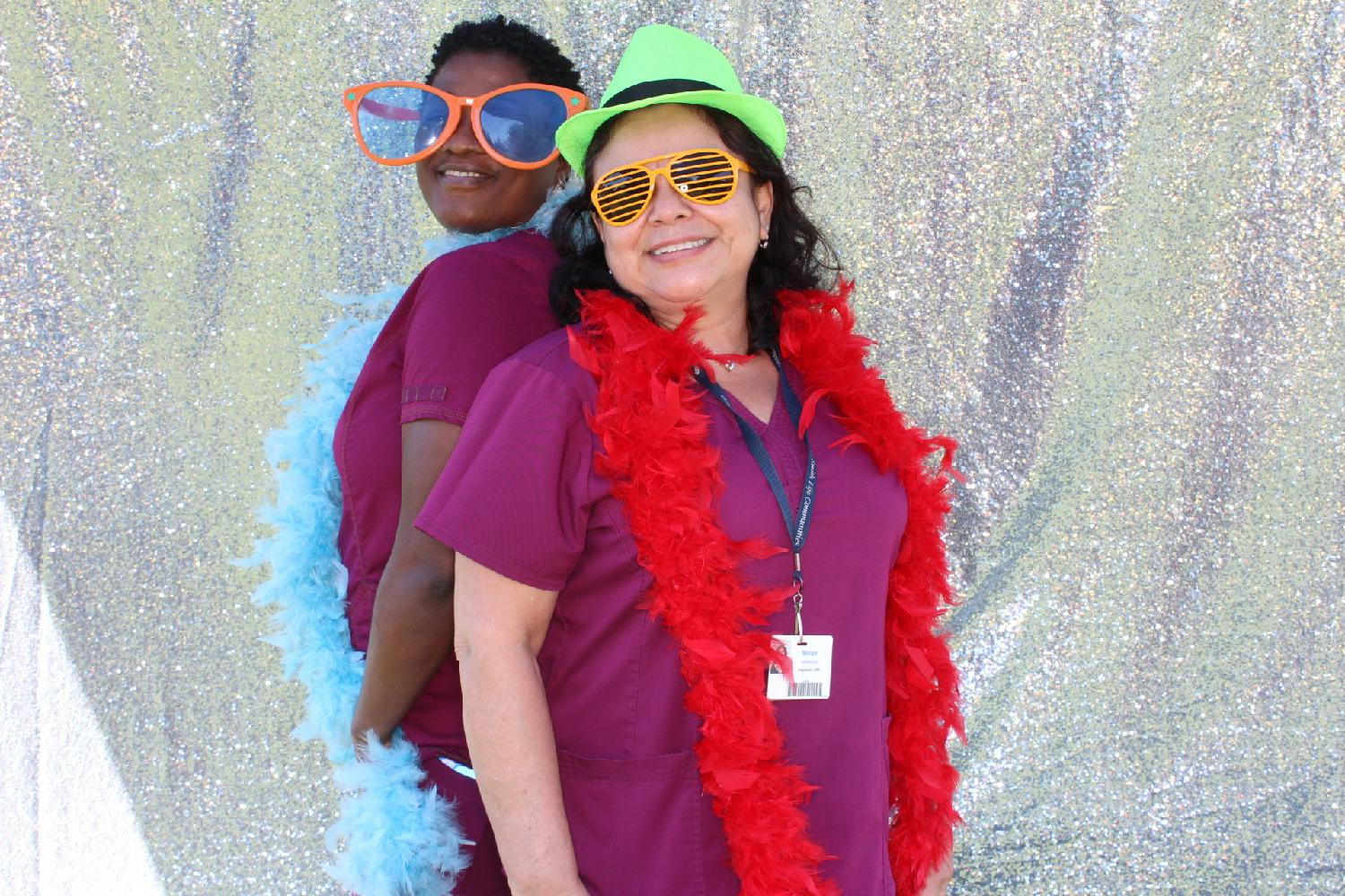 Our GNA's posing for the photo booth during the team carnival 