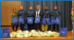 Andrews Federal staff assist with the 500 turkeys and groceries that were donated to local members of the community