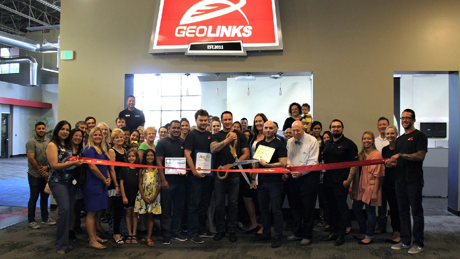 GeoLinks staff members celebrate the ribbon cutting of our headquarters in beautiful Camarillo, California. 