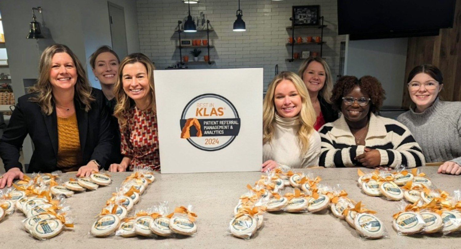 Team members celebrating being named #1 in Patient Referral Management and Analytics for Best in KLAS Awards.
