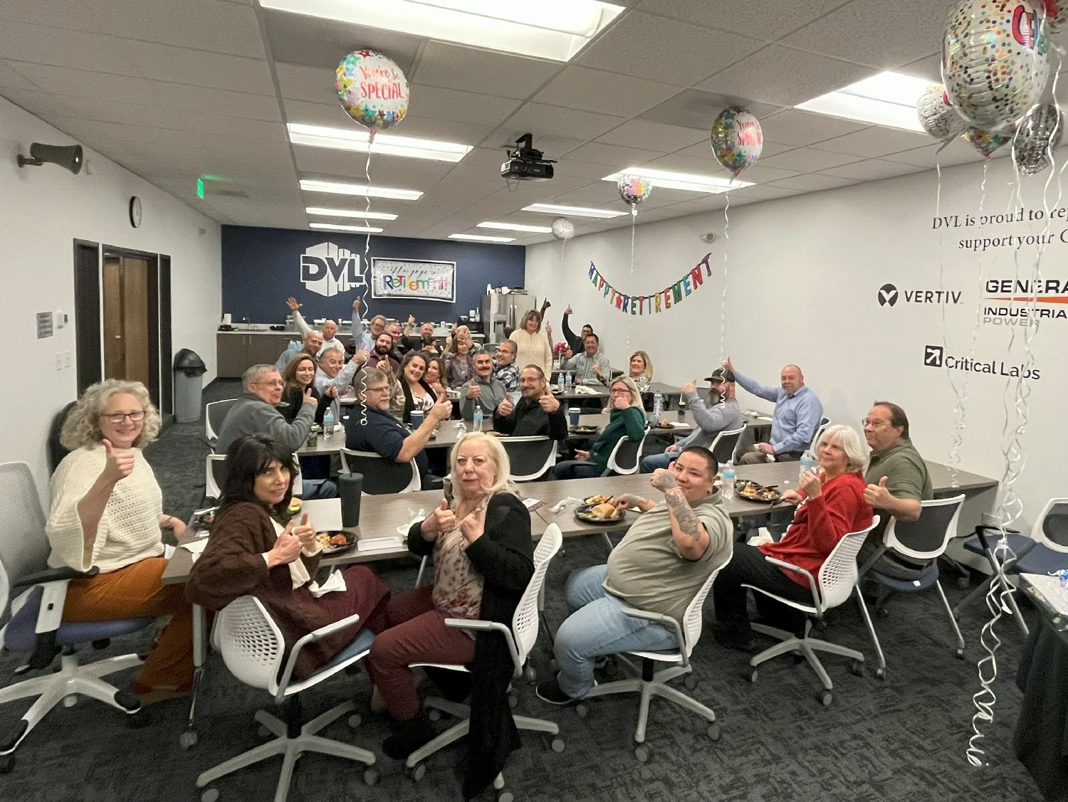 Denver office associates and guests celebrate the retirement of one of our tenured employee-owners.
