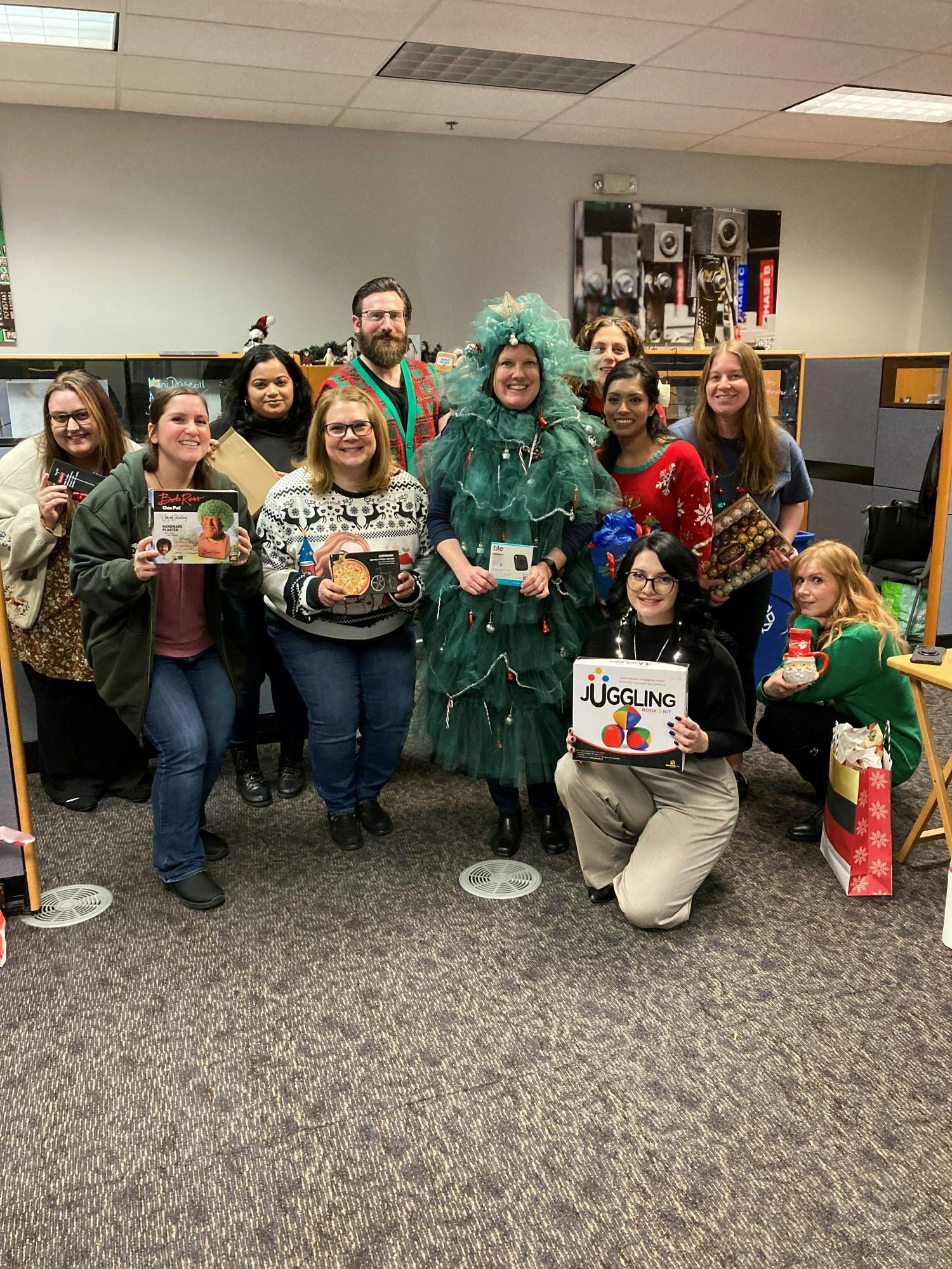 Associates in our Bristol office having some fun collaboration during an annual gift exchange