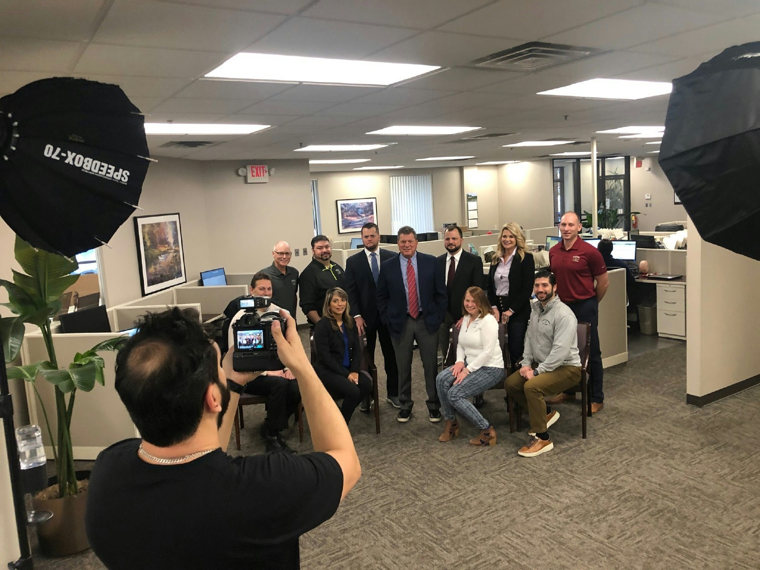 Scene from a photo shoot of our Leadership team in December 2021. 