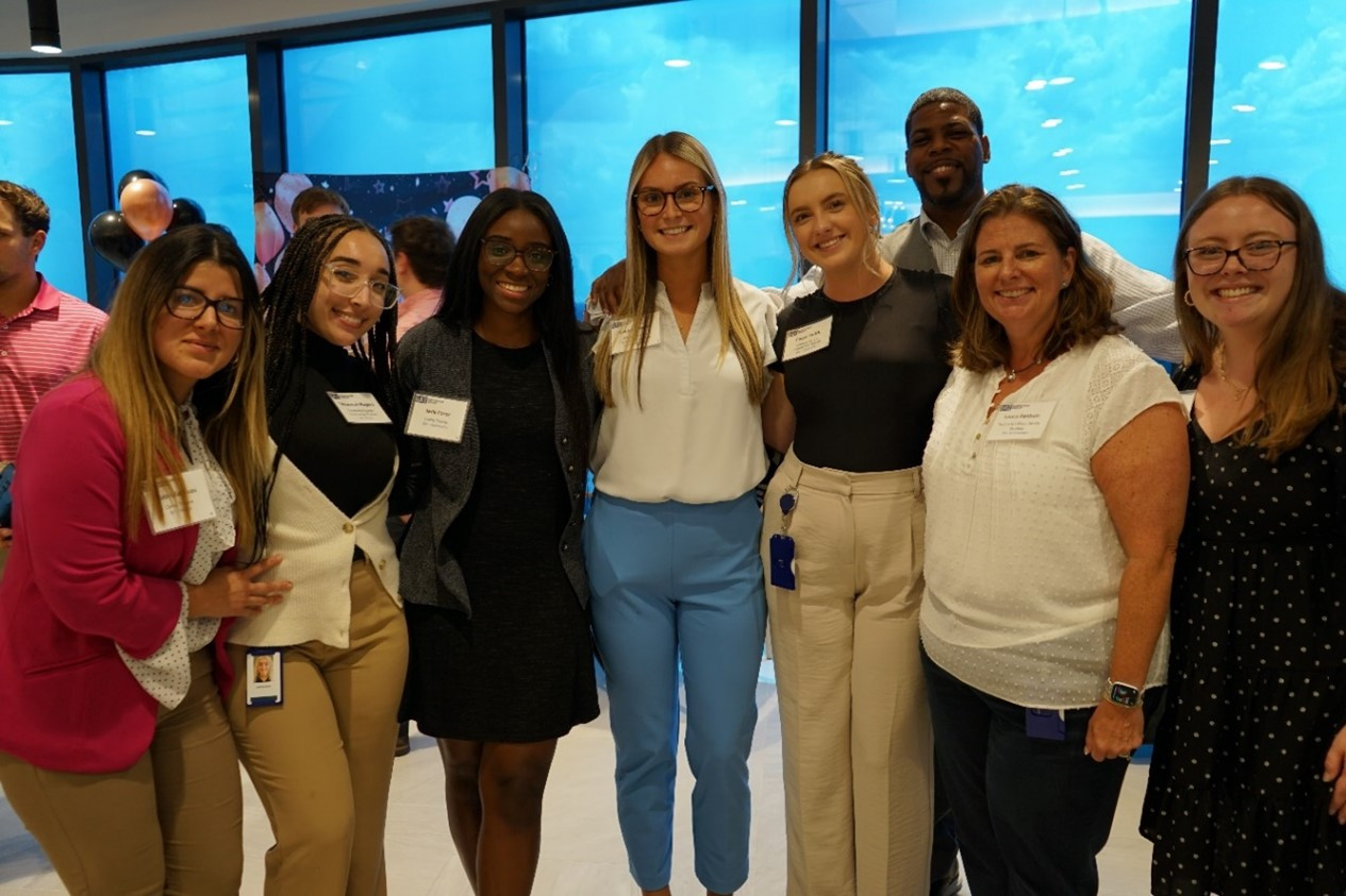 IAT Insurance Group trainees gather to celebrate a colleague's retirement in Raleigh.