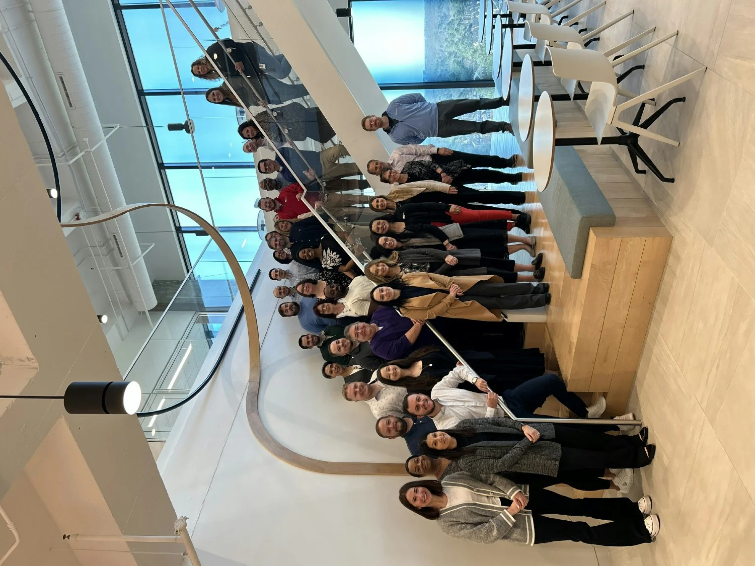 Team members gathered at IAT's headquarters in Raleigh, NC for training on a new tech system. 