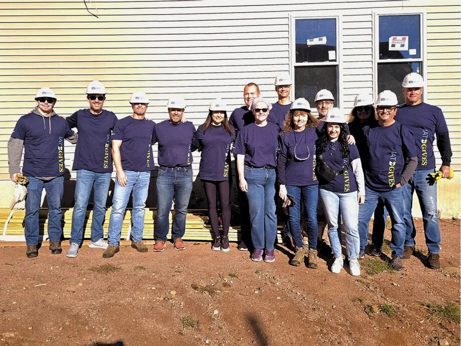 IAT’s CT office, including CEO Bill Cunningham, volunteering at Habitat for Humanity during IAT's Giving Month.