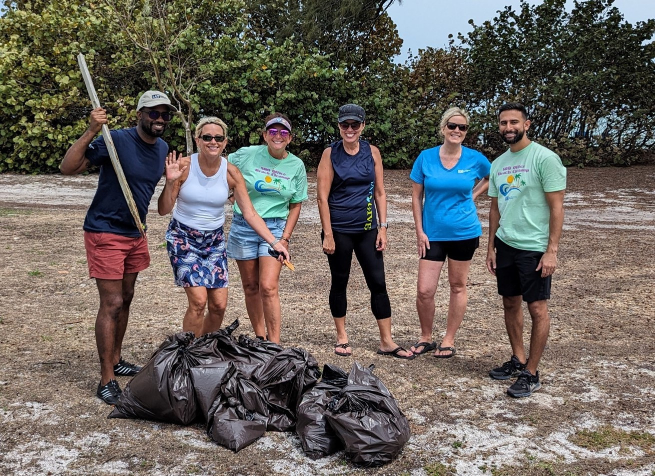 IAT Insurance Group's Sarasota team helps keep Florida beaches clean.