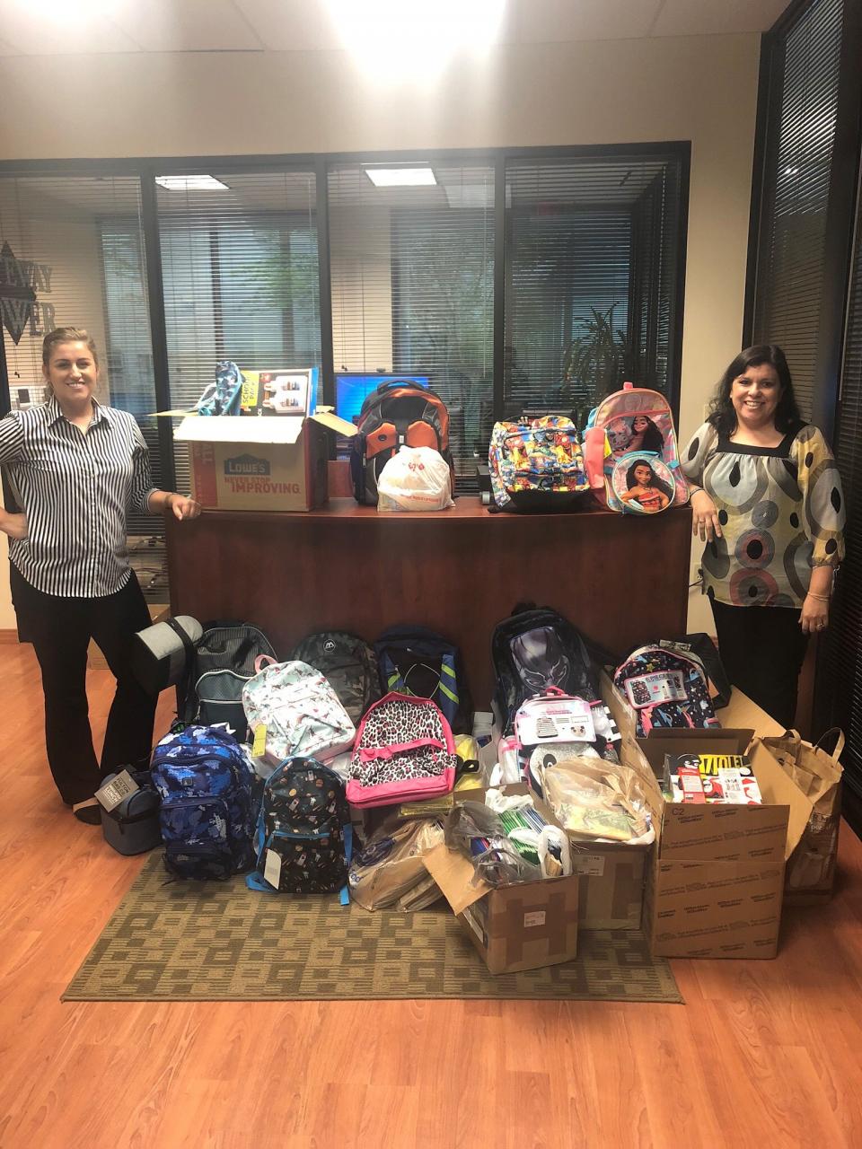 Dallas Office Collecting Backpacks to Donate