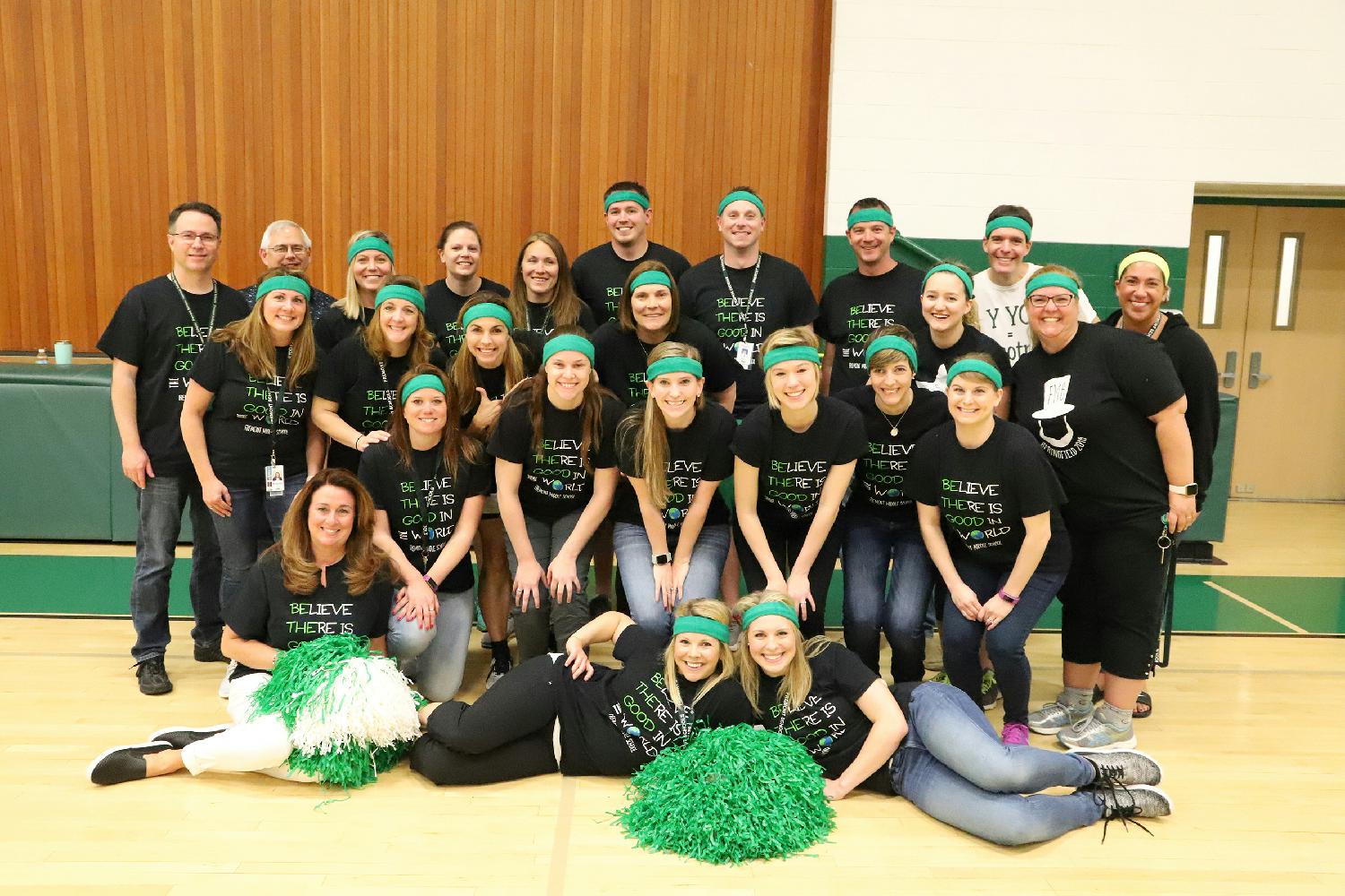 Fremont School District 79 staff cheering for the Middle School volleyball tournament