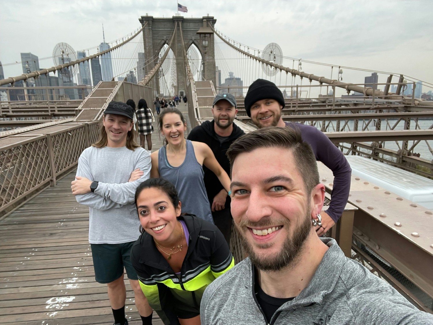 Thrivers jogging across the Brooklyn Bridge.