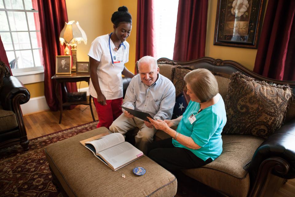 Alacare staff share memories with an Alacare patient