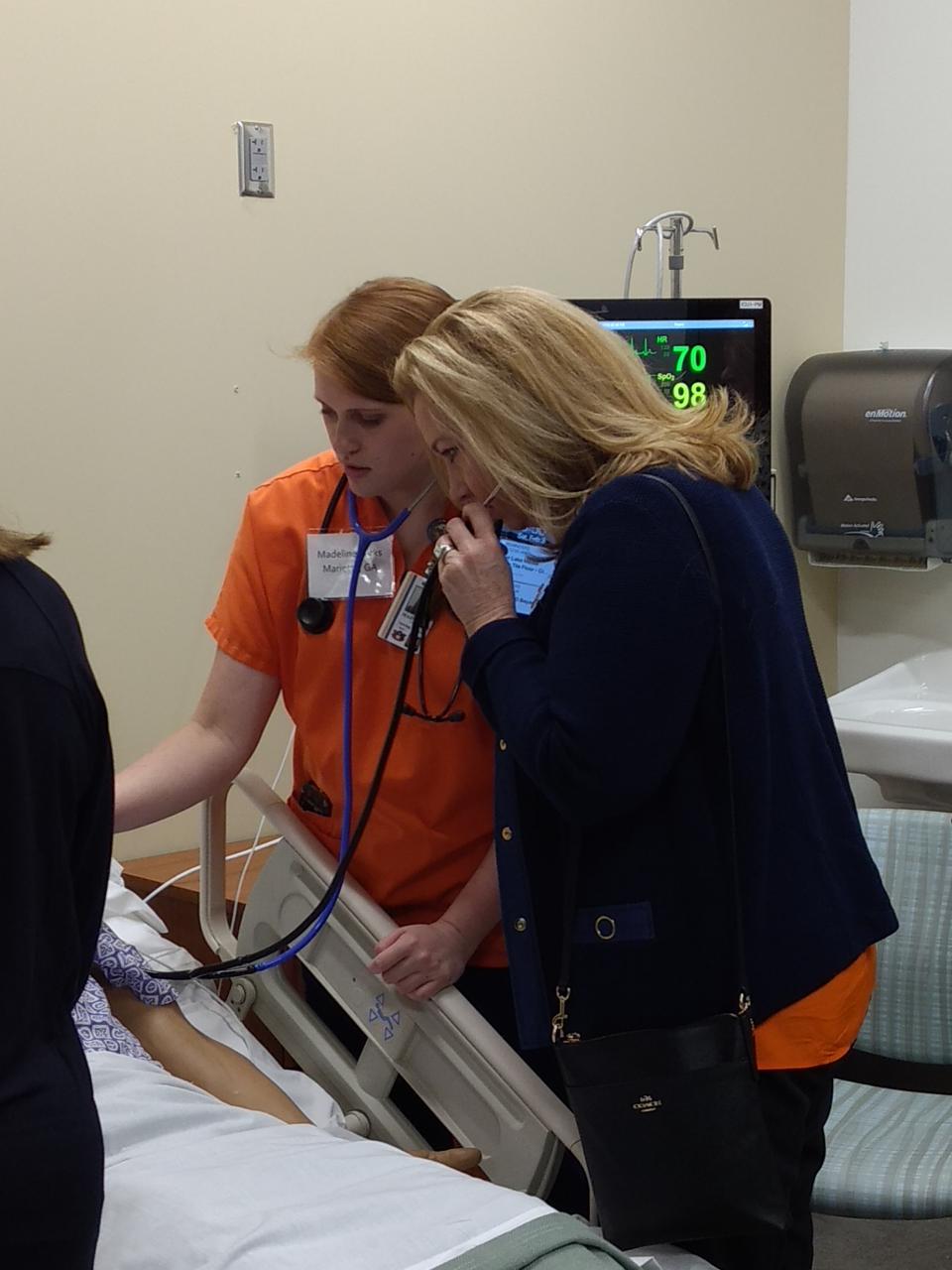 Alacare CEO, Susan Brouillette, at the Auburn University Simulation Lab being shown the \
