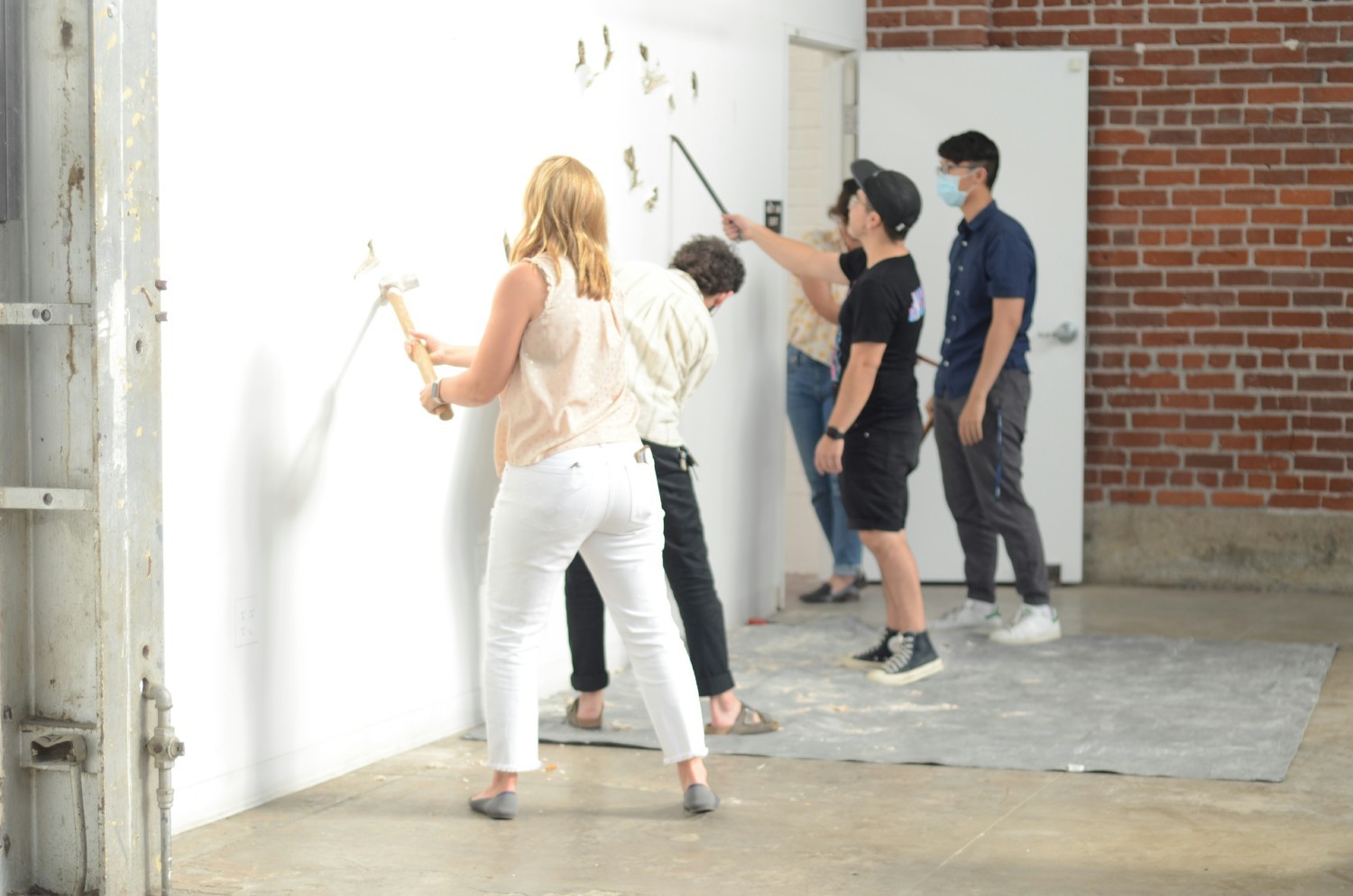 Demolition derby happy hour with axes.  A safe team-building event.