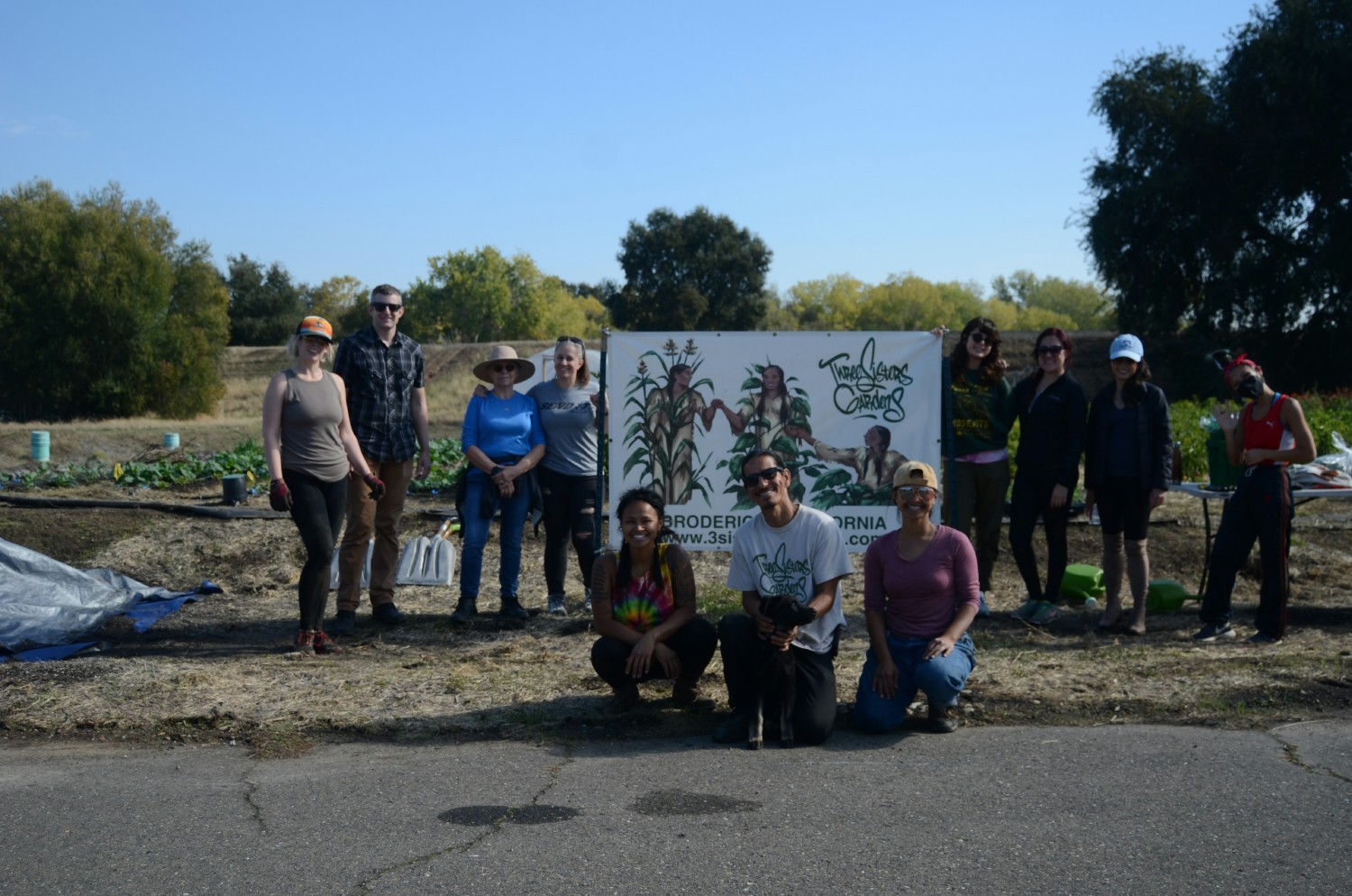 Getting dirty and proud to be volunteering at a community garden.