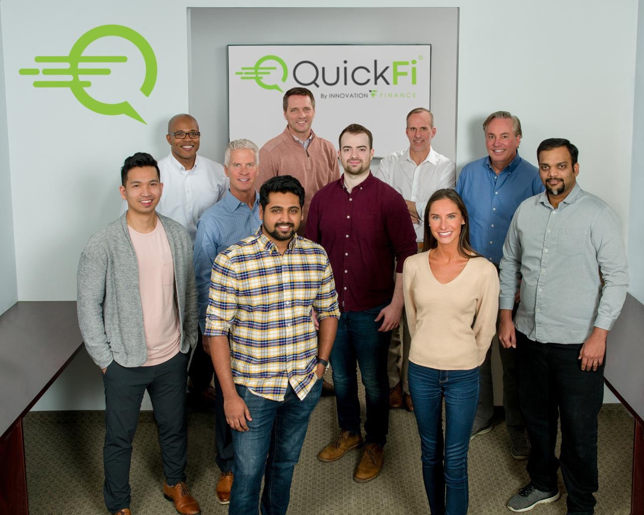 Early photo of QuickFi founders in Fairport, NY.