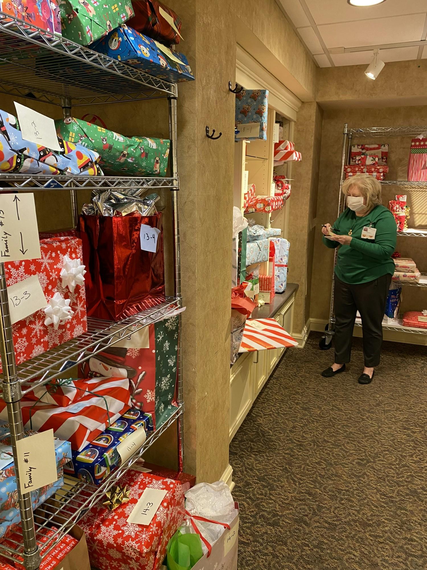 Checking gifts for our staff Toy Drive-serving over 140 staff with Christmas gifts for children and grandchildren
