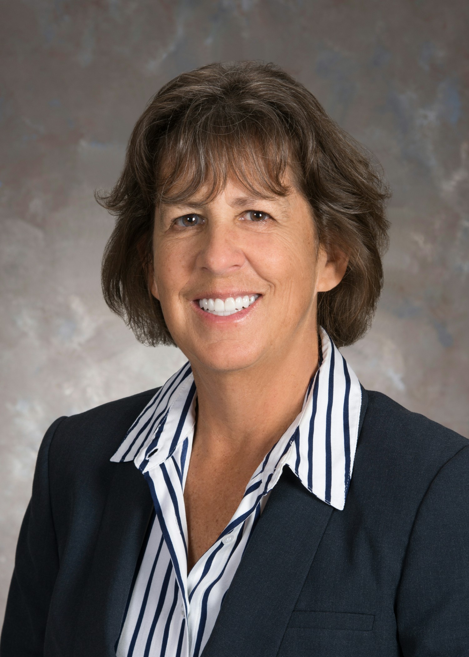 Joan Williams, Principal and Chief Financial Officer