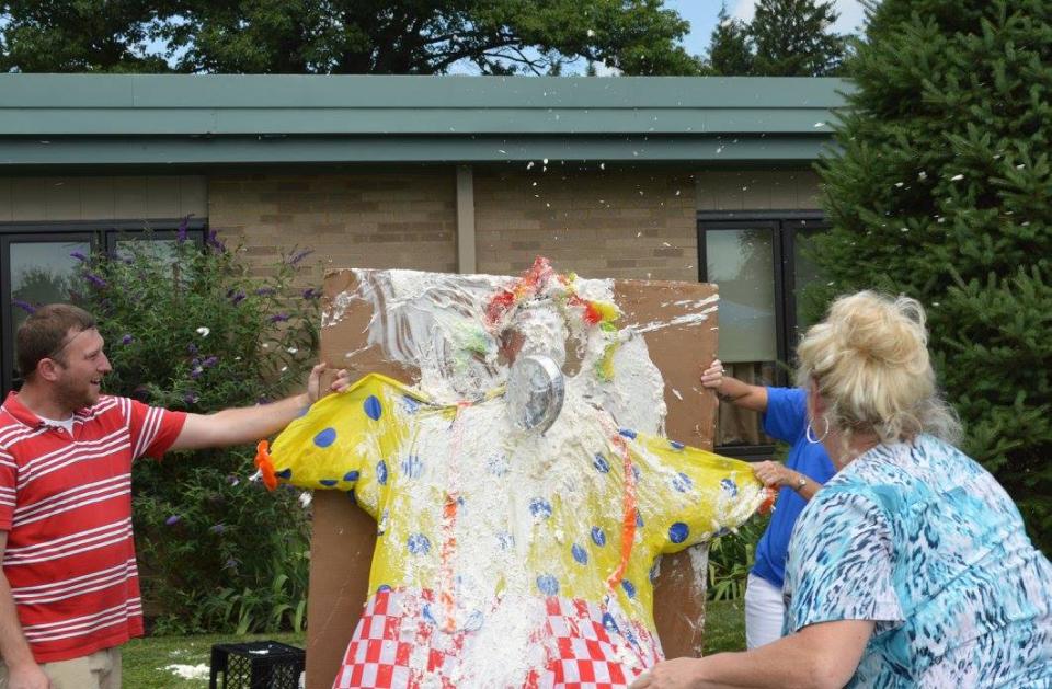 Carnival, managers get a pie in the eye for charity