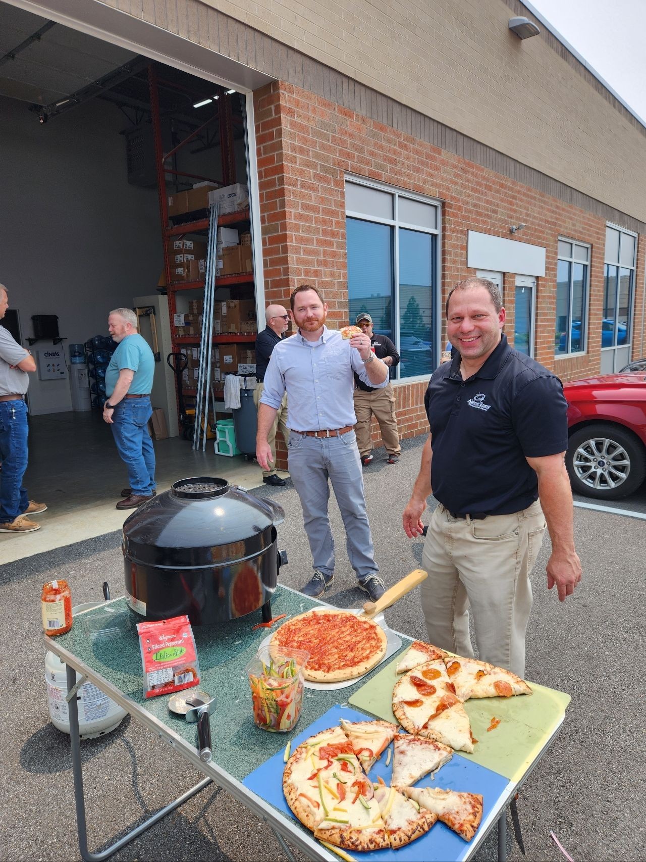 Pizza Making and Building Bonds: Our employee lunch cultivates a strong and cohesive company culture.