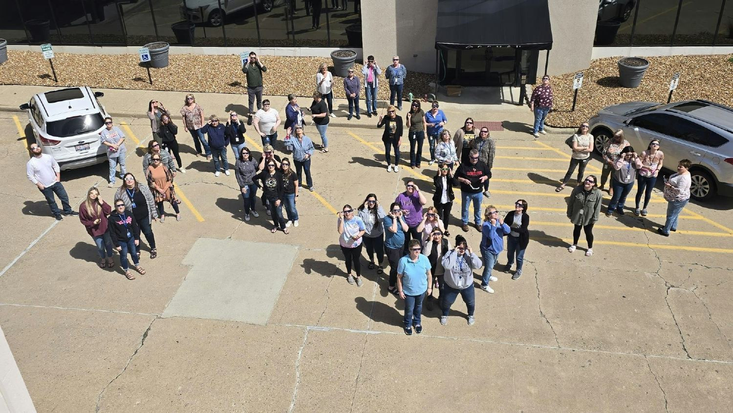 Several employees dressing up for decades day during our CCMSI spirit week