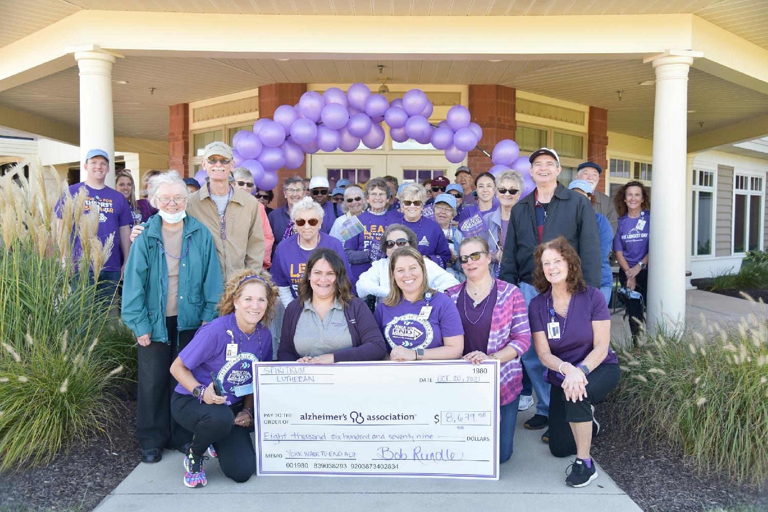 Team members and residents support Alzheimer's Association by hosting local memory walk.