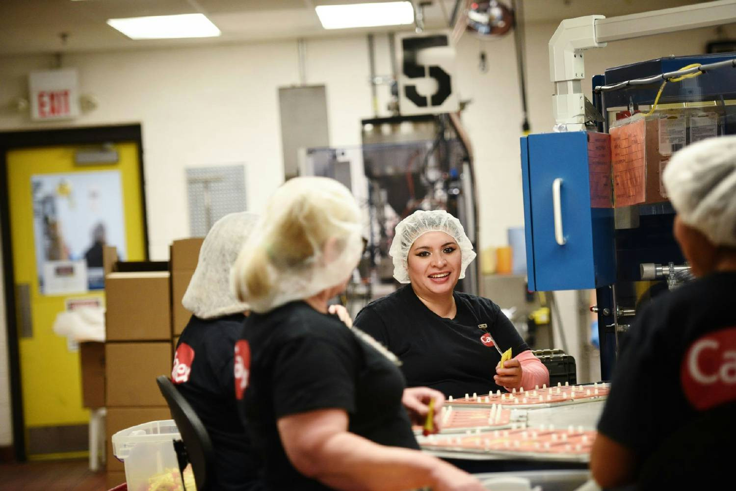 Our production team working hard to bring you the Carmex lip balm you love!