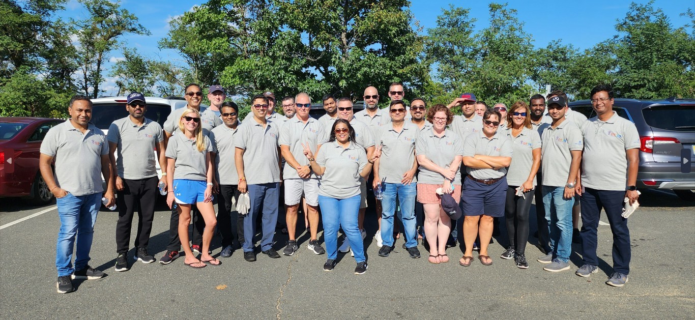NJ colleagues coming together DRIVE Week 2023. They impacted the community by taking part in a beach cleaning!