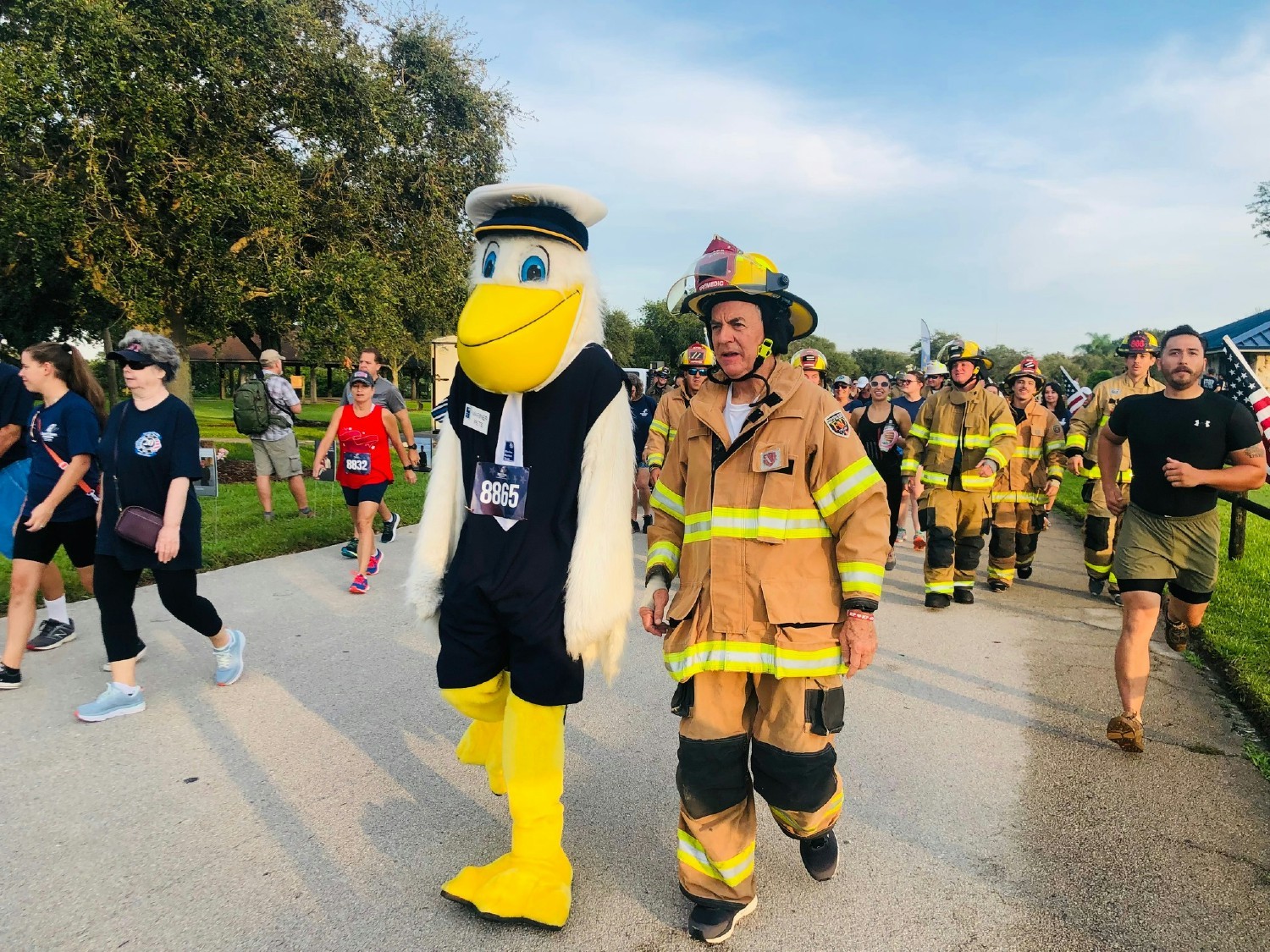 Our Bank President, Bill Penney, runs the local Tunnel to Towers Run in full-fire gear with our mascot Mariner Pete.