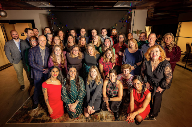 Celebration of Great Place To Work certification in 2023 holiday party. Picture of all staff.