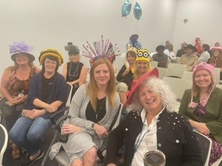 Employees who participated in Crazy Hat Day at our corporate head quarters. 