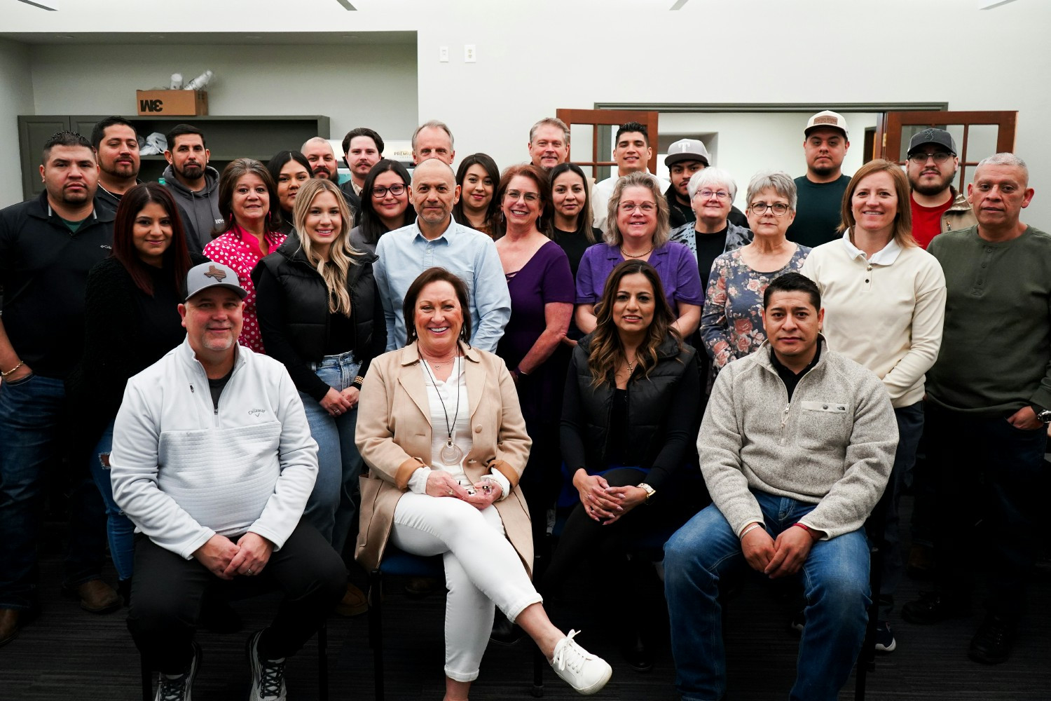 Employees enjoying lunch together on Employee Appreciation Day