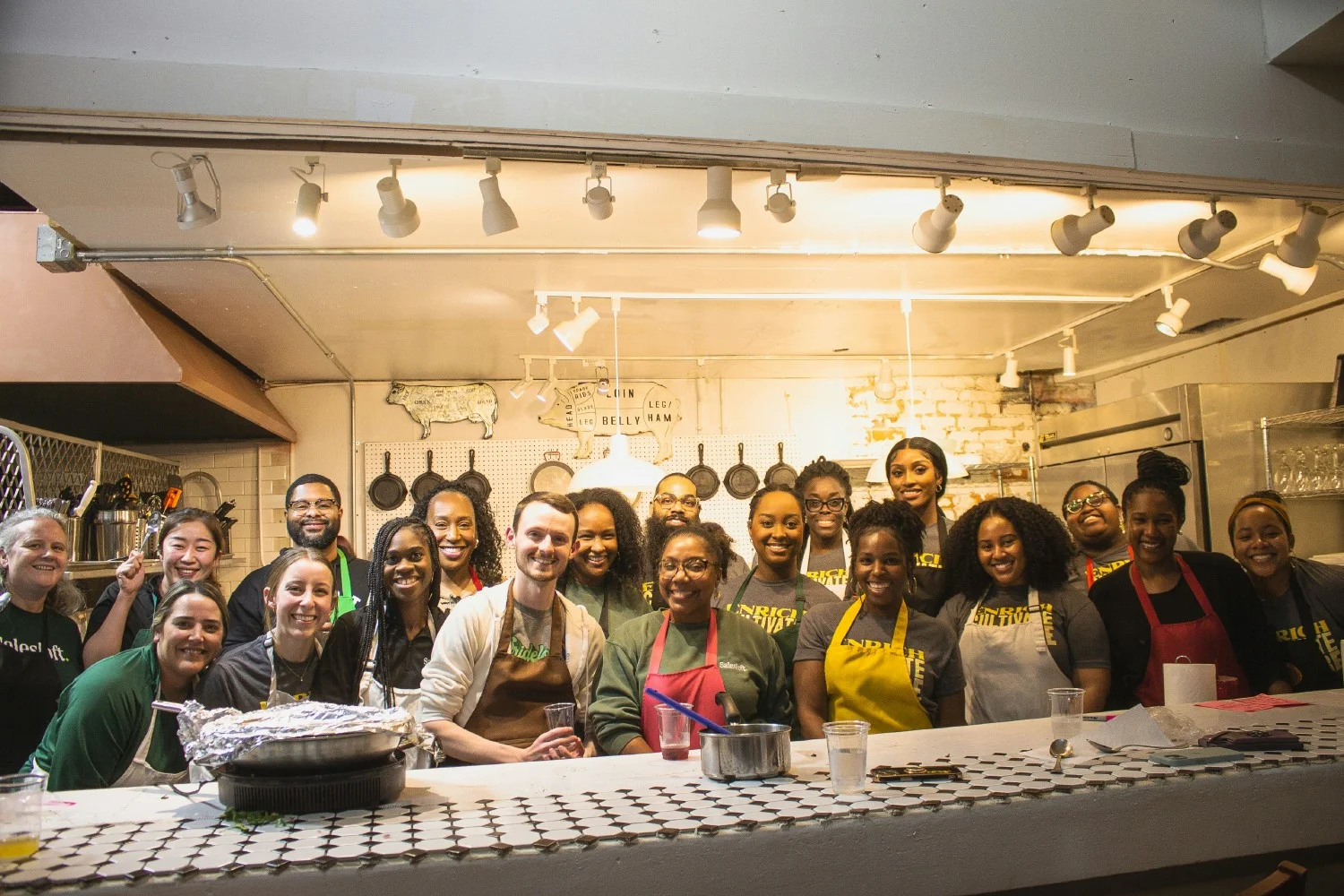 Lofters attend a cooking class for a Black History Month event. This year's theme was 